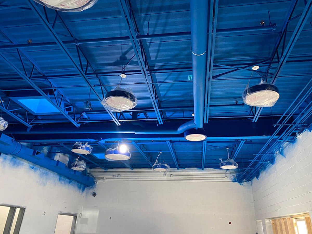 Fireproofed blue ceiling in a facility Essential Services Your Fireproofing Contractor Must Offer to Ensure You're Up-to-Code