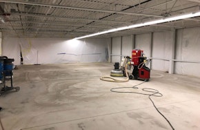 Flooring maintenance being done in a facility. How Maintaining Flooring Reduces Industrial Dust and Containment Issues