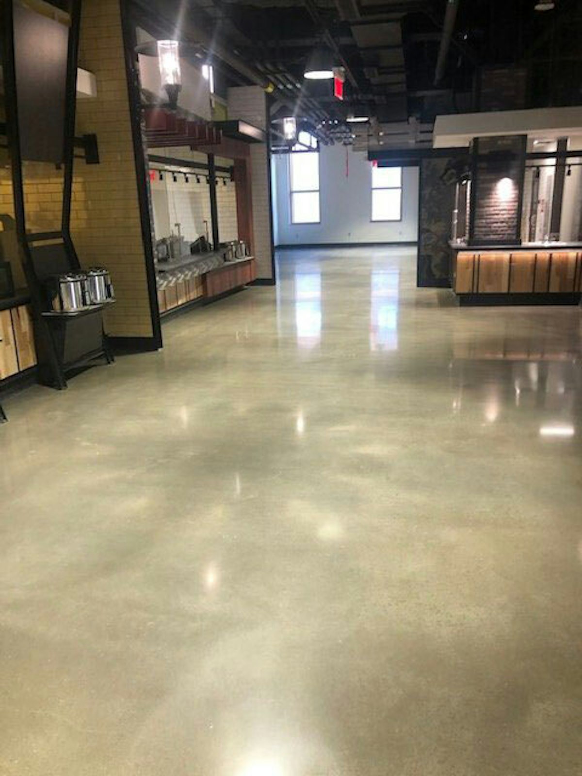 Polished concrete floor in a company's office How Polished Concrete Floor Finishes Will Enhance Your Company Culture