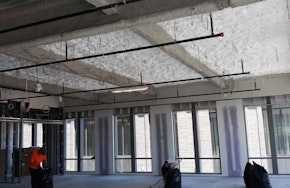 Ther­mal-acousti­cal insulation in a building being renovated. How Ther­mal-Acousti­cal Insulation Protects and Upgrades Your Multi-Use Facility