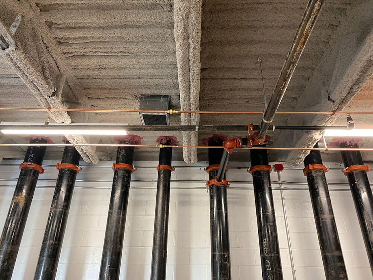 Fireproofed ceiling in a commercial facility. What Is the Difference Between Commercial Fire Protection and Prevention?